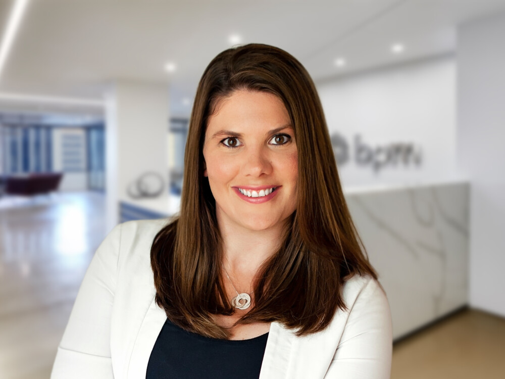 Innovative CPA standing in office.