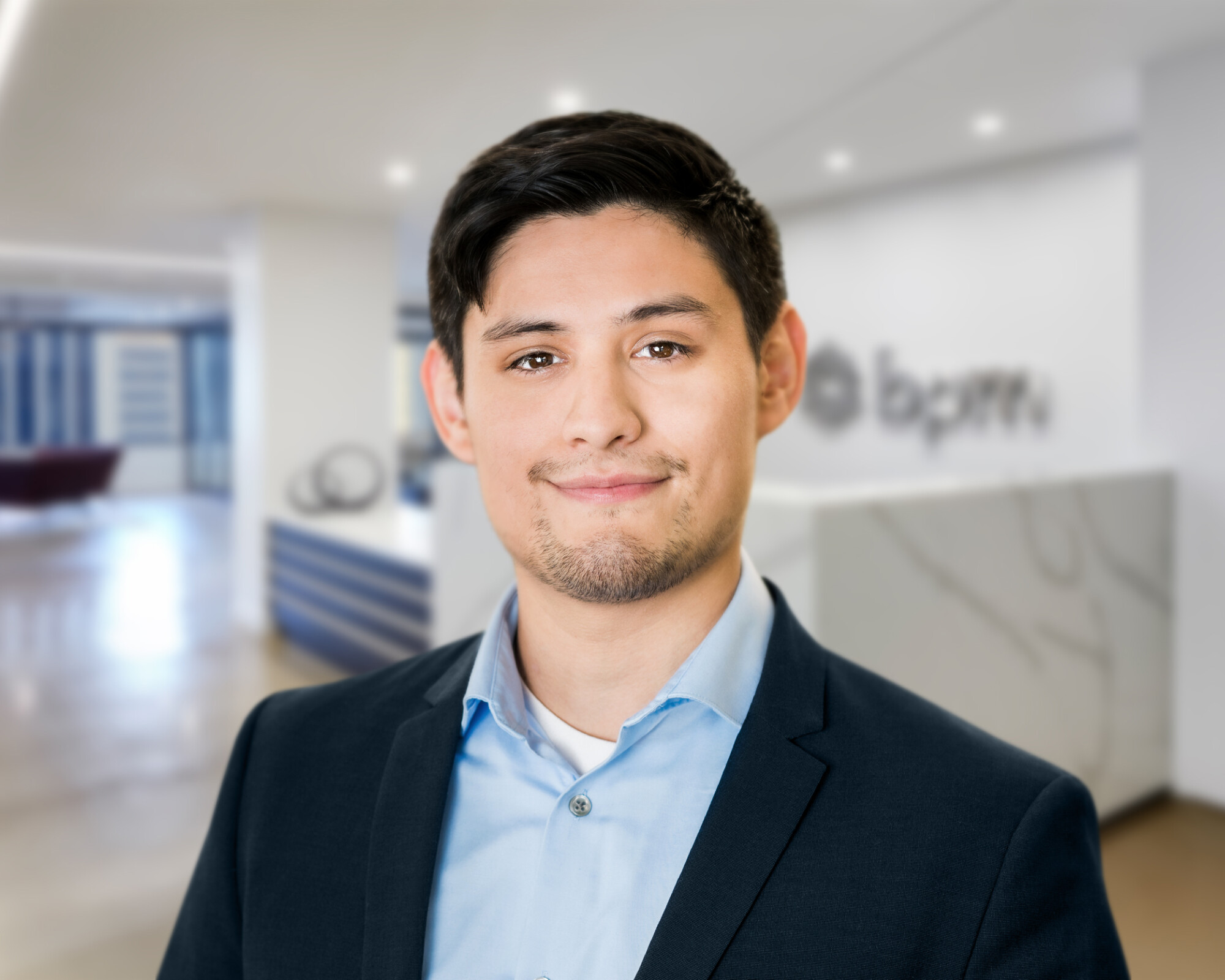 man-in-suit-standing-in-office