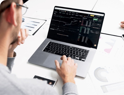 Man working on an open laptop